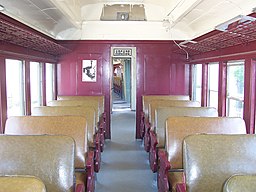 Interior image of one of the passenger cars on the Arcade & Attica steam locomotive excursion / Wikimedia / Shinerunner
Link: https://commons.wikimedia.org/wiki/File:Arcade_%26_Attica_railroad.jpg