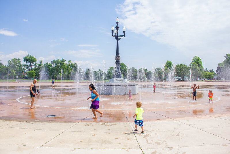 People enjoying the fountain splash pad in Martin Luther King Jr, Memorial Park / Flickr / Buffalo Omlsted Parks Conservancy
Link: https://flickr.com/photos/ourbfloparks/48189823812/in/photolist-2gqnrHf-hG1mCP-4bNQ4D-7PTAm4-zvkuNN-rrvgTU-5NeF3X-5NiX4q-5evgR1-26vpik2-oPR39i-8DEcGJ-zvjNGA-oxmh14-7H3zag-zxgV1k-oxmh7g-oPzbvB-oxmiPf-oPzbzK-oxmDQW-5N5gM4-2gqnqfA-rrwbHU-2gqnrV4-2gqns7S-2gqnsmE-2gqna6S-2gqnave-2gqnuya-2gqnctC-2gqnb36-2gqnssM-2gqnscM-2gqnbv5-2gqncRX-oxmDvs-oMPcaS-oPPg7d-oxmj9y-yznBn1-5N3Wn1-2hwKVvA-2gqntZ4-2gqnuaz-2gqnrwD-2gqn9tK-zePwv1-2gqntcT-2gqntad