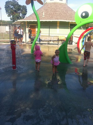 Kids enjoying splash pad at CFJ Park / Flickr / Meg J
Link: https://flickr.com/photos/megginandtravis/7717681632/in/photolist-2nLkfXZ-2nLsic7-2nLrJMr-2nLsih2-2nLrksj-cKZ8Sq-cKZ935-cKZ9cb-cKZ9ny-bpCMLw