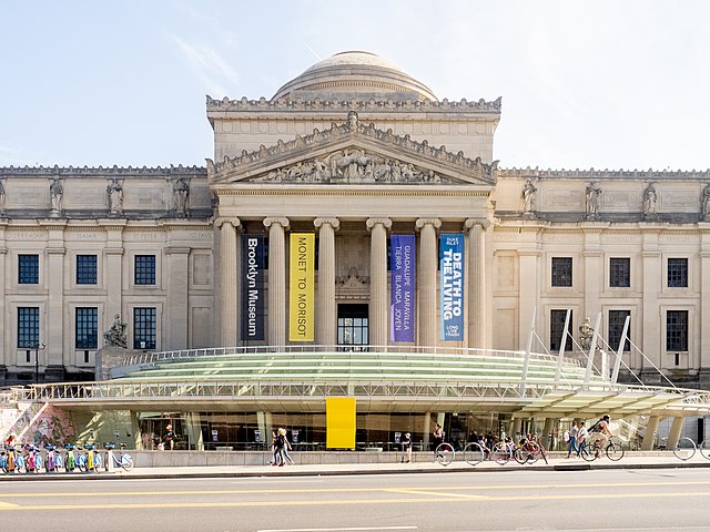 Exterior view of Brooklyn Museum / Wikipedia / Ajay_Suresh 
Link: https://en.wikipedia.org/wiki/File:Brooklyn_Museum_-_Entrance_(52302265063).jpg 
