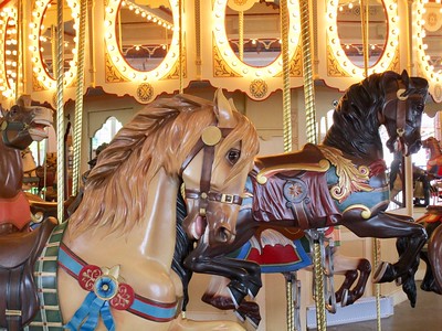 Carousel horses at Seabreeze Amusement Center / Flickr / BunnyHugger 
Link: https://flic.kr/p/2jiutnh
