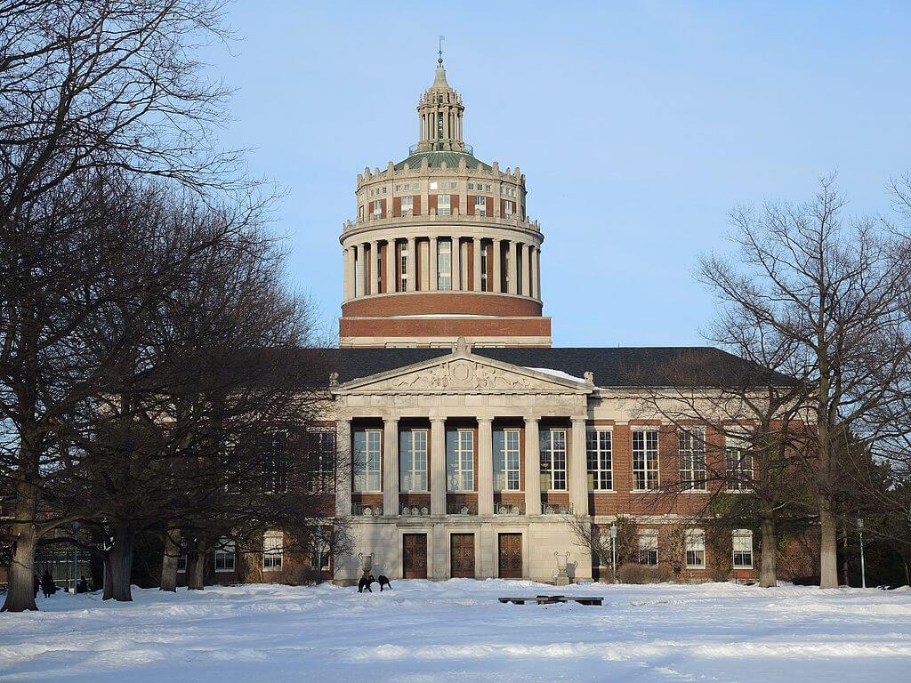 Library of University of Rochester / Wikipedia / Daniel Penifield
URL: https://en.wikipedia.org/wiki/University_of_Rochester#/media/File:RushRheesLibraryInWinterObliqueFromLeft.jpg