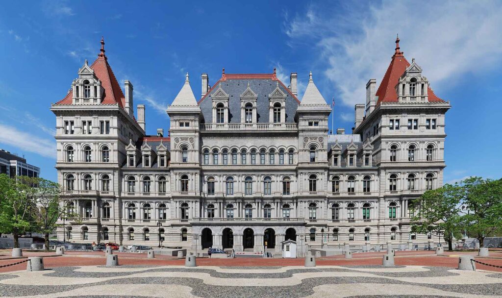 Outside view of New York State Capitol / Wikimedia Commons / Matt H. Wade
Link: https://commons.wikimedia.org/wiki/File:NYSCapitolPanorama.jpg