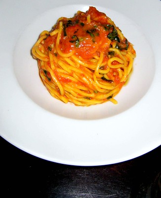 Spaghetti tomato & Basil at Scarpetta / Flickr / G M 
Link: https://flic.kr/p/6mxbBK 

