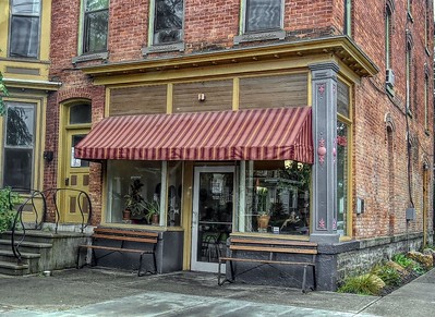 Exterior view of Gimme Coffee! / Flickr / Jo Zimny
Link: https://flic.kr/p/2bnr7GD 
