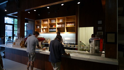 Interior view of Blue Bottle Coffee / Flickr / Chum-Hung Eric Cheng 
Link: https://flic.kr/p/8jNwy4 
