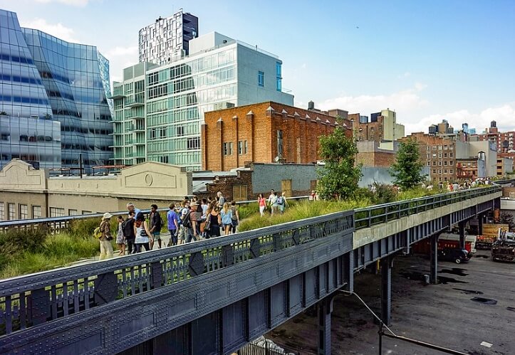 Visitors stroll the first section of the High Line Park / Wikipedia / Dansnguyen 
Link: https://en.wikipedia.org/wiki/High_Line#/media/File:AHigh_Line_Park,_Section_1a.jpg